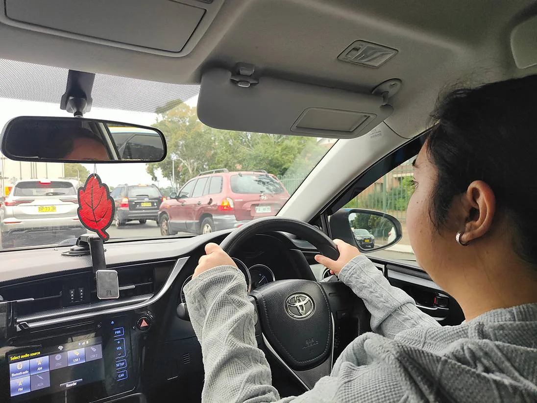Learner driver practising motorway merging on the Hume Highway near Liverpool