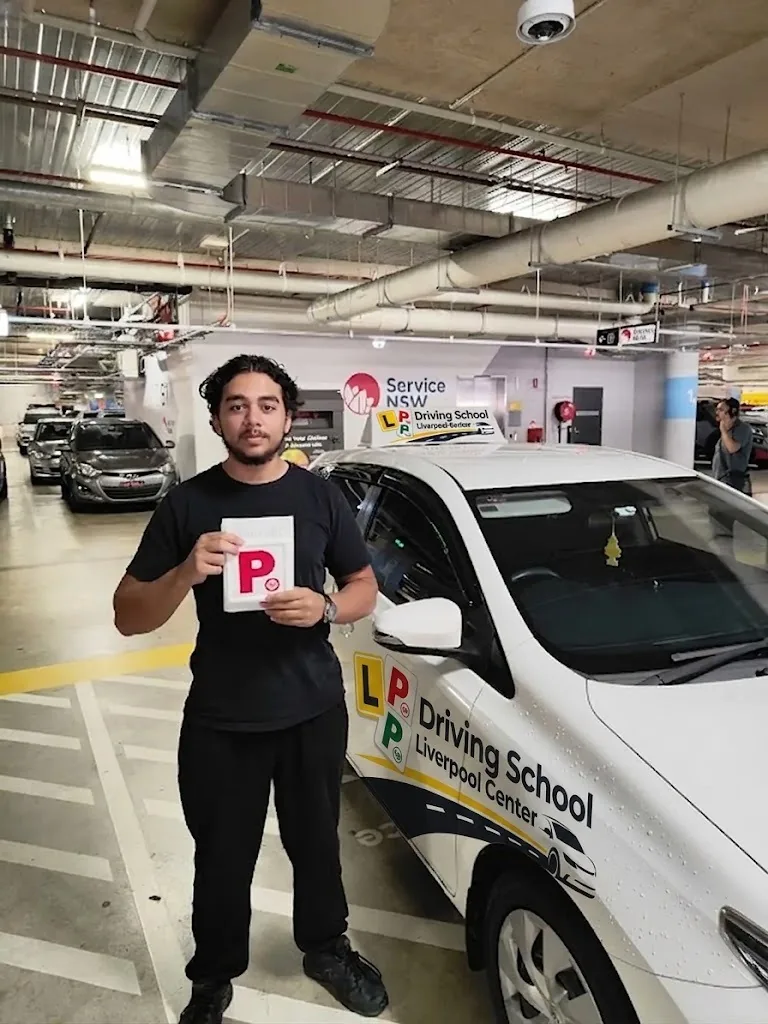 Overseas licence conversion student with P plates after local driving lessons in Liverpool